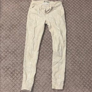 Snake print skinny jeans